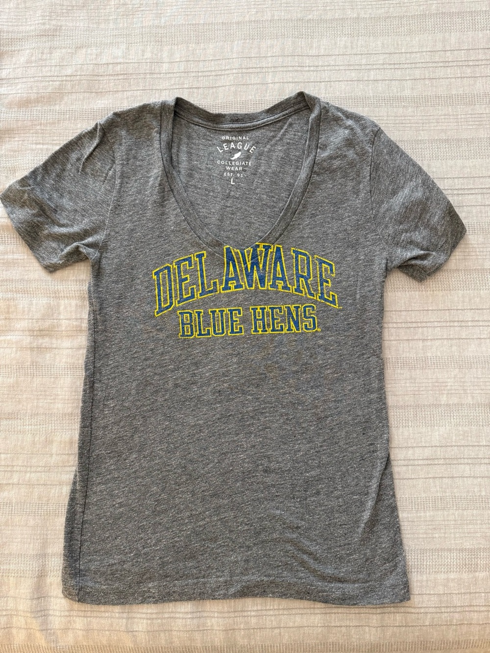 League Gray V-Neck Tee with Yellow and Blue Delaware Blue Hens Graphic